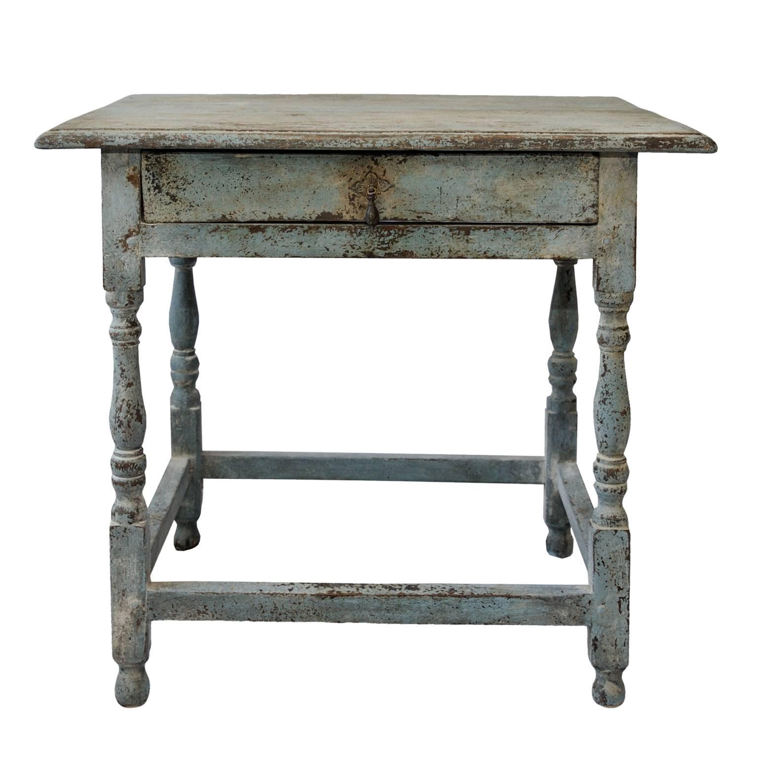 This is a rather lovely English mid-18th century George II painted side table. The top with moulded edges, the frieze with single drawer and 'teardrop' handle. Standing on block and turned legs joined by stretchers, circa 1740.
(Paintwork