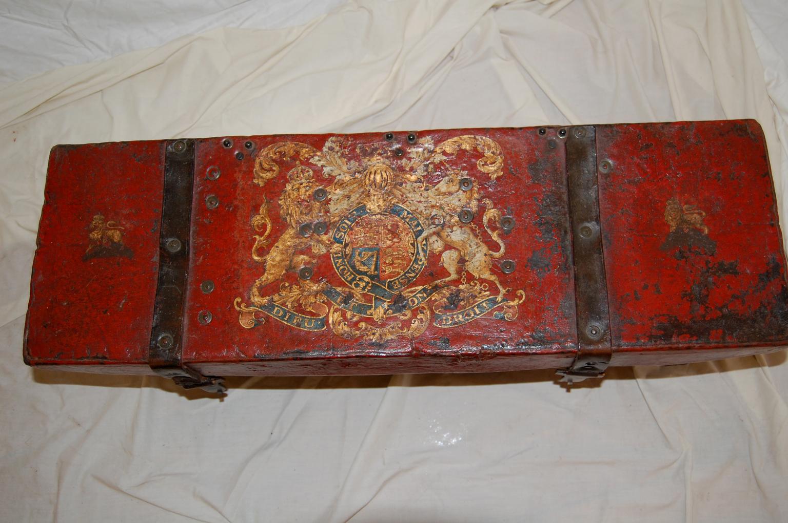English military munitions box of thick full cowhide leather over cork with painted royal coat of arms and mottos on the top: 