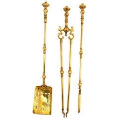 English Mid-19th Century Set of Three Cast Brass Firetools