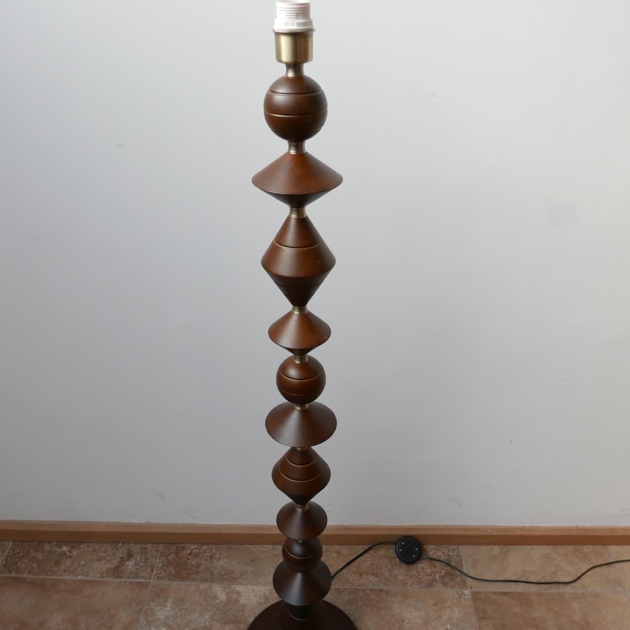 An English floor lamp. 

Geometric stacked shapes. 

Re-wired and PAT tested. 

Generally good condition, one segment has a hairline split. 

Dimensions: 134 height x 28 diameter in cm. 

Delivery: POA.

 