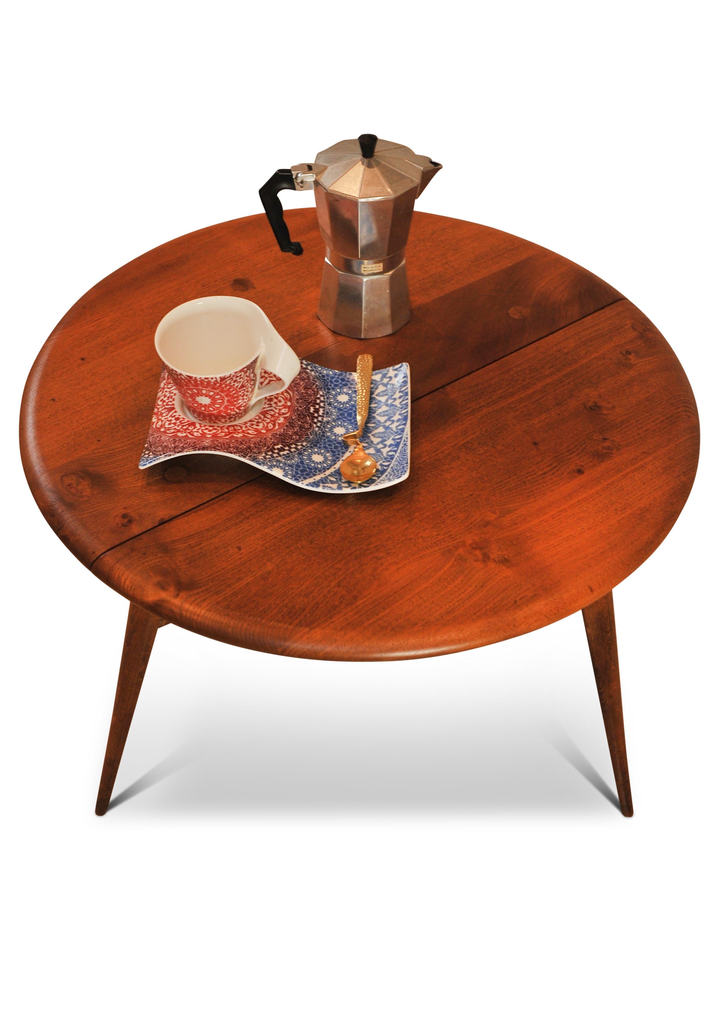 English Mid Century Hand Made Ercol Beech & Elm Drop Leaf Coffee Lounge Table.
Ercol furniture was exhibited at the 1951 Festival of Britain, as it represented the latest style and fashion in furniture design and manufacture.

Ercol produces