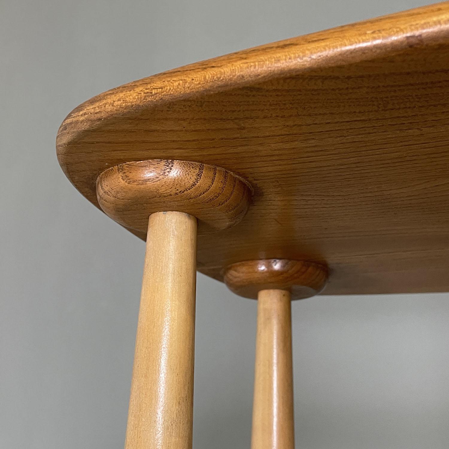 Mid-20th Century English mid-century modern light wood library with cabinet by Ercol, 1960s