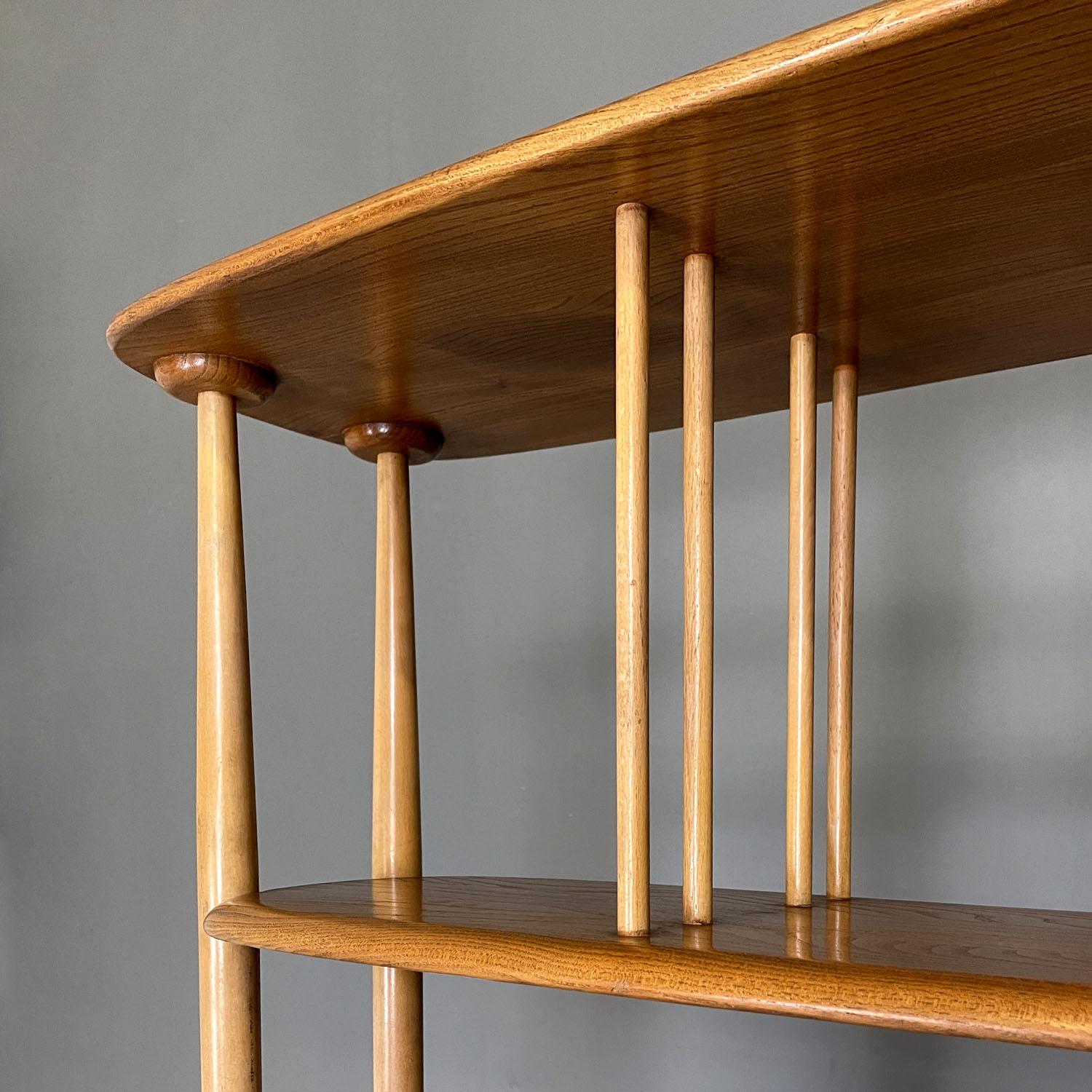 English mid-century modern light wood library with cabinet by Ercol, 1960s 1