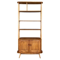 English mid-century modern light wood library with cabinet by Ercol, 1960s