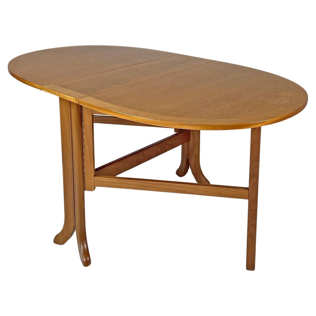 English mid-century modern wooden dining table with flap doors, 1960s For Sale