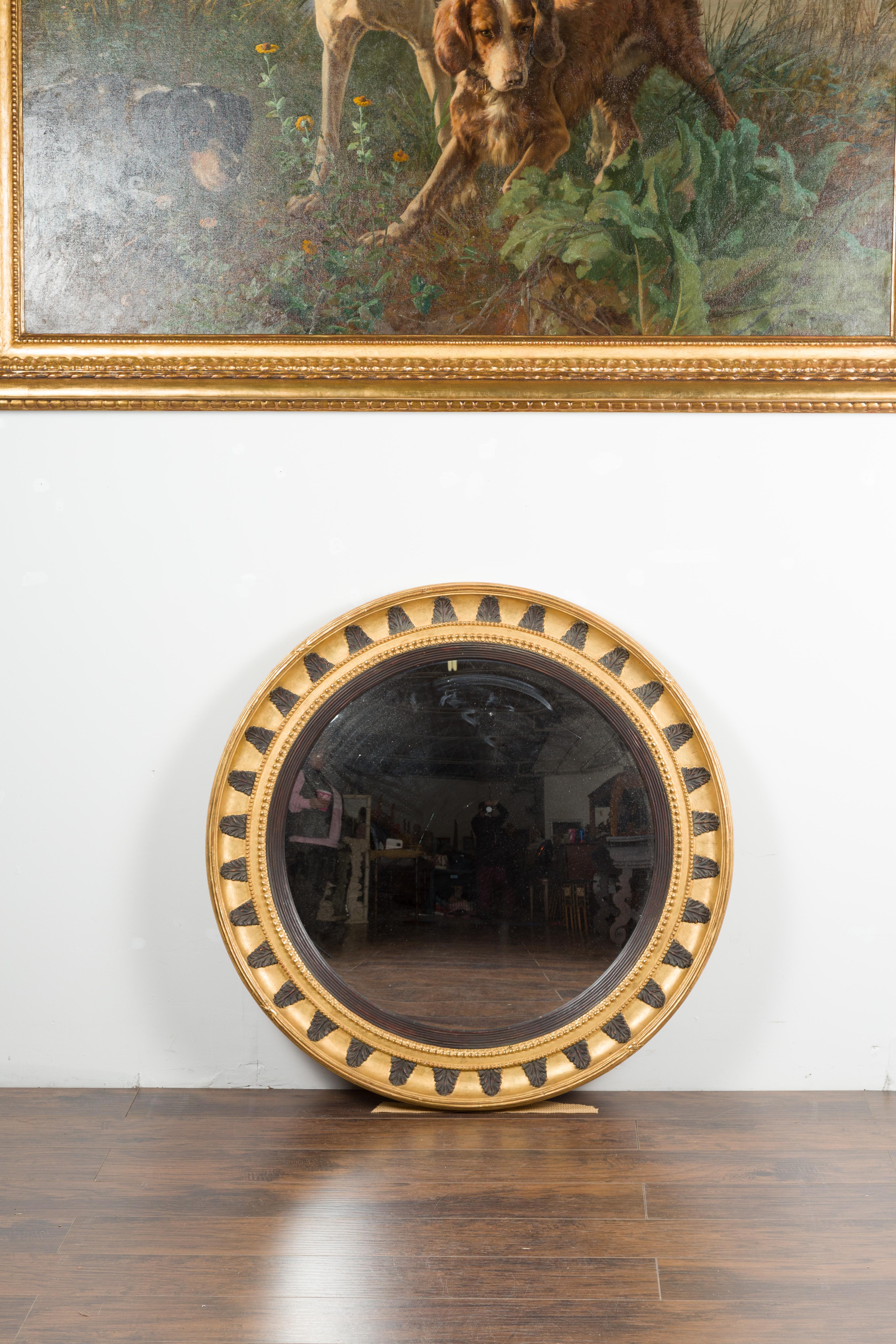 Mid-Century Modern English Midcentury Bullseye Convex Mirror with Gilded Frame and Ebonized Leaves