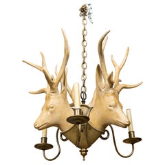 English Midcentury Carved Wooden Deer Heads Light Fixture with Brass Accents