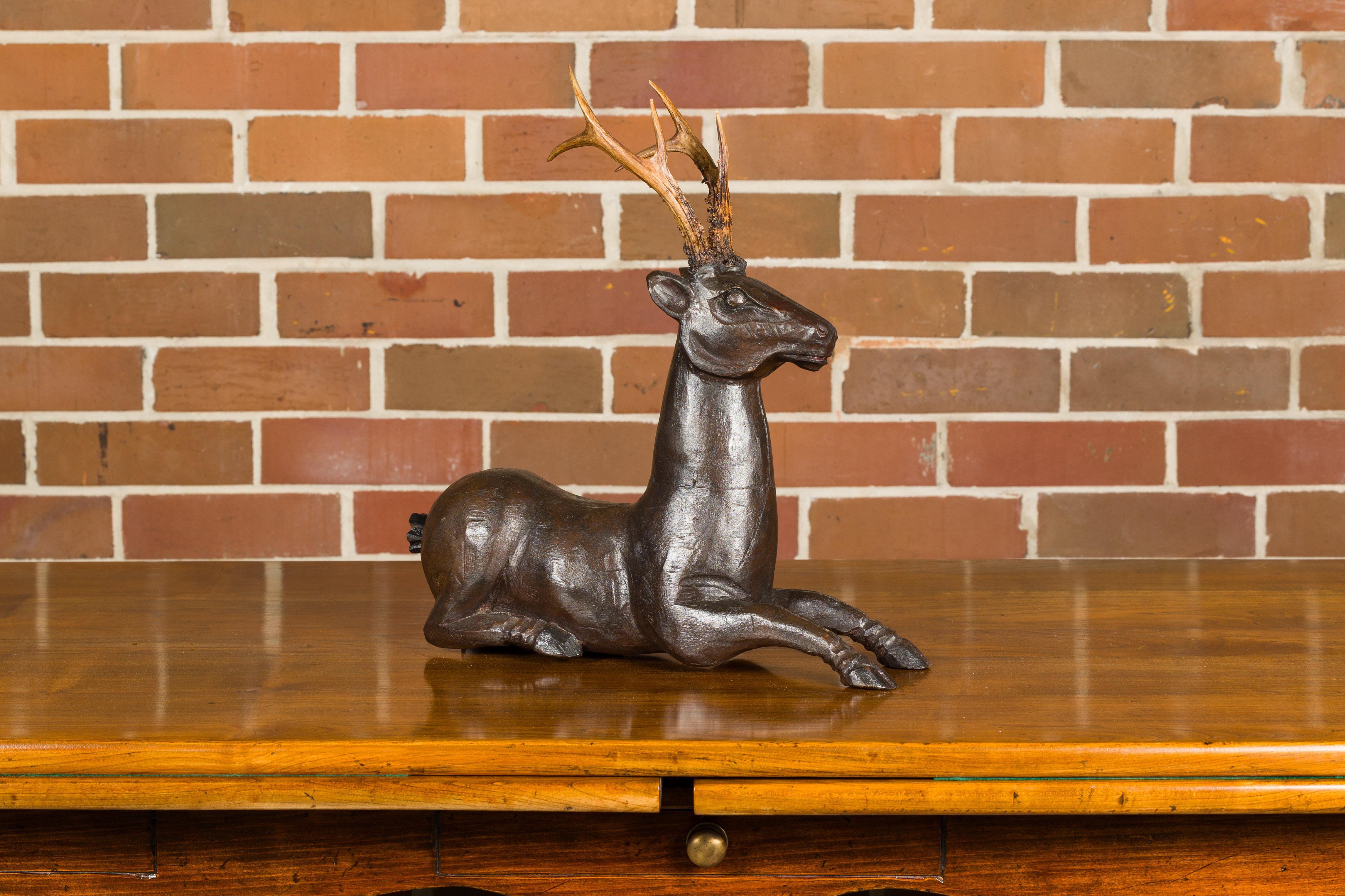 wooden deer statue