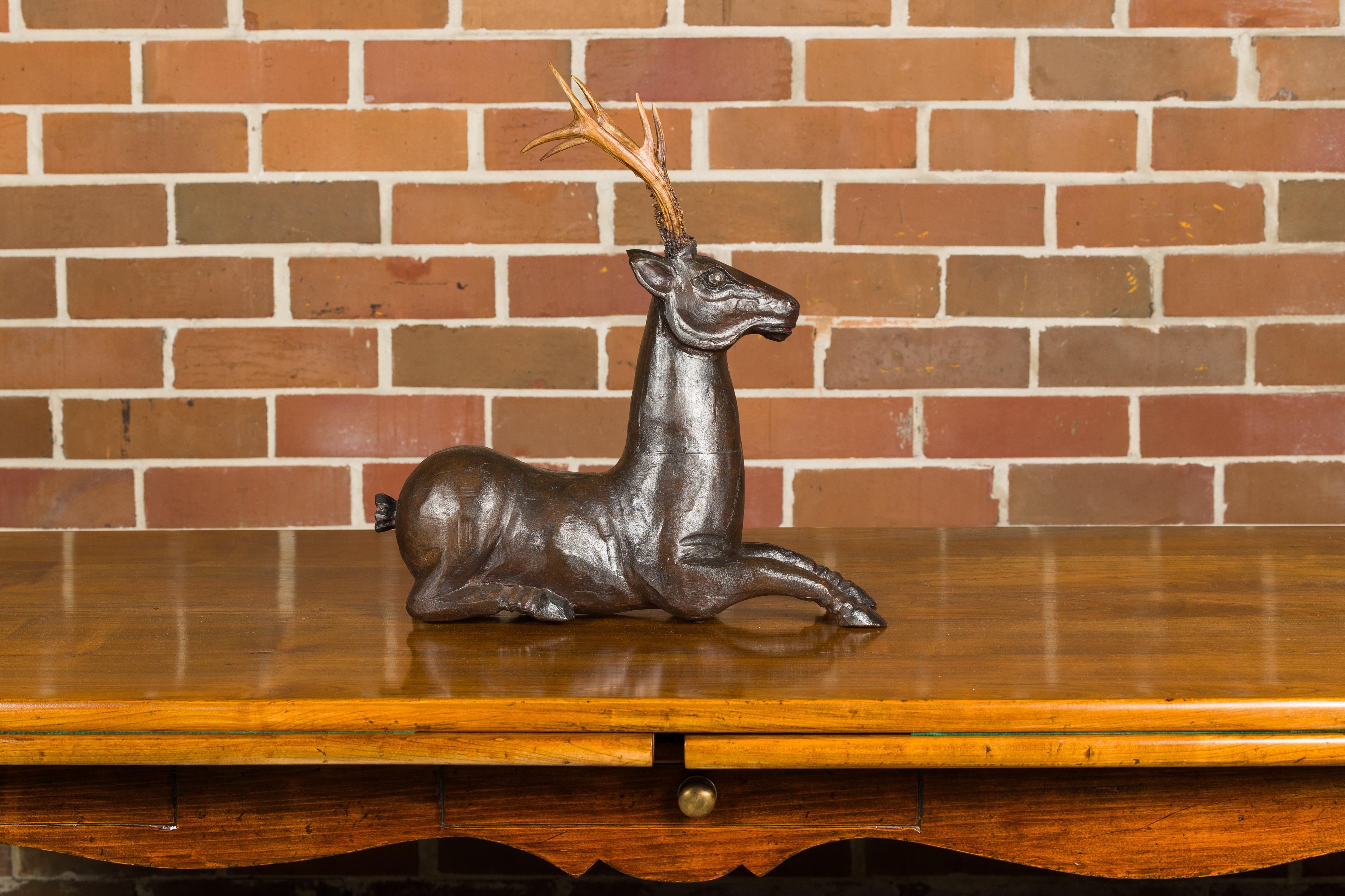 Mid-Century Modern English Midcentury Carved Wooden Reclining Stag Sculpture with Real Antlers