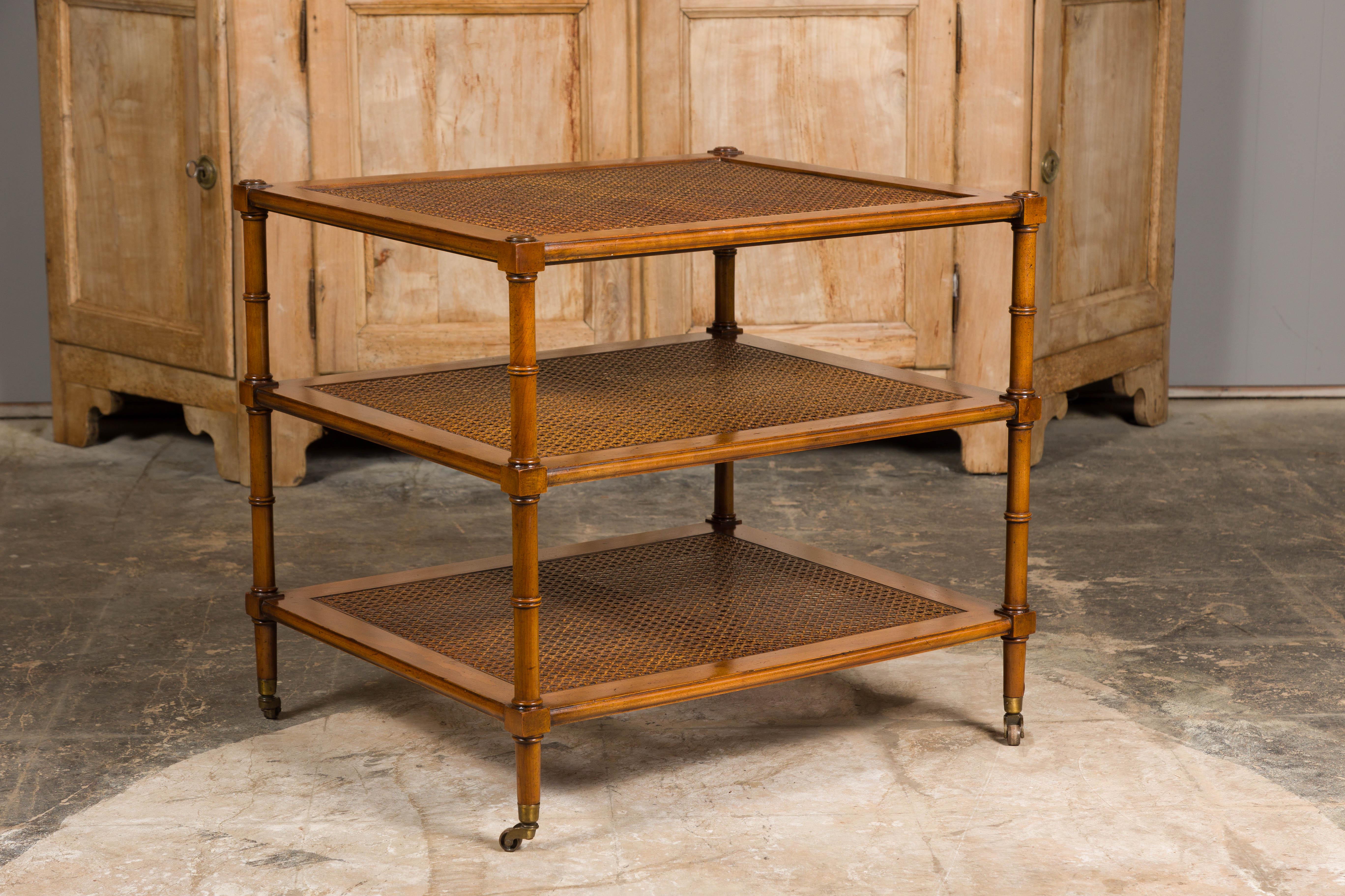 English Midcentury Faux Bamboo Tiered Table on Casters with Three Cane Shelves For Sale 5