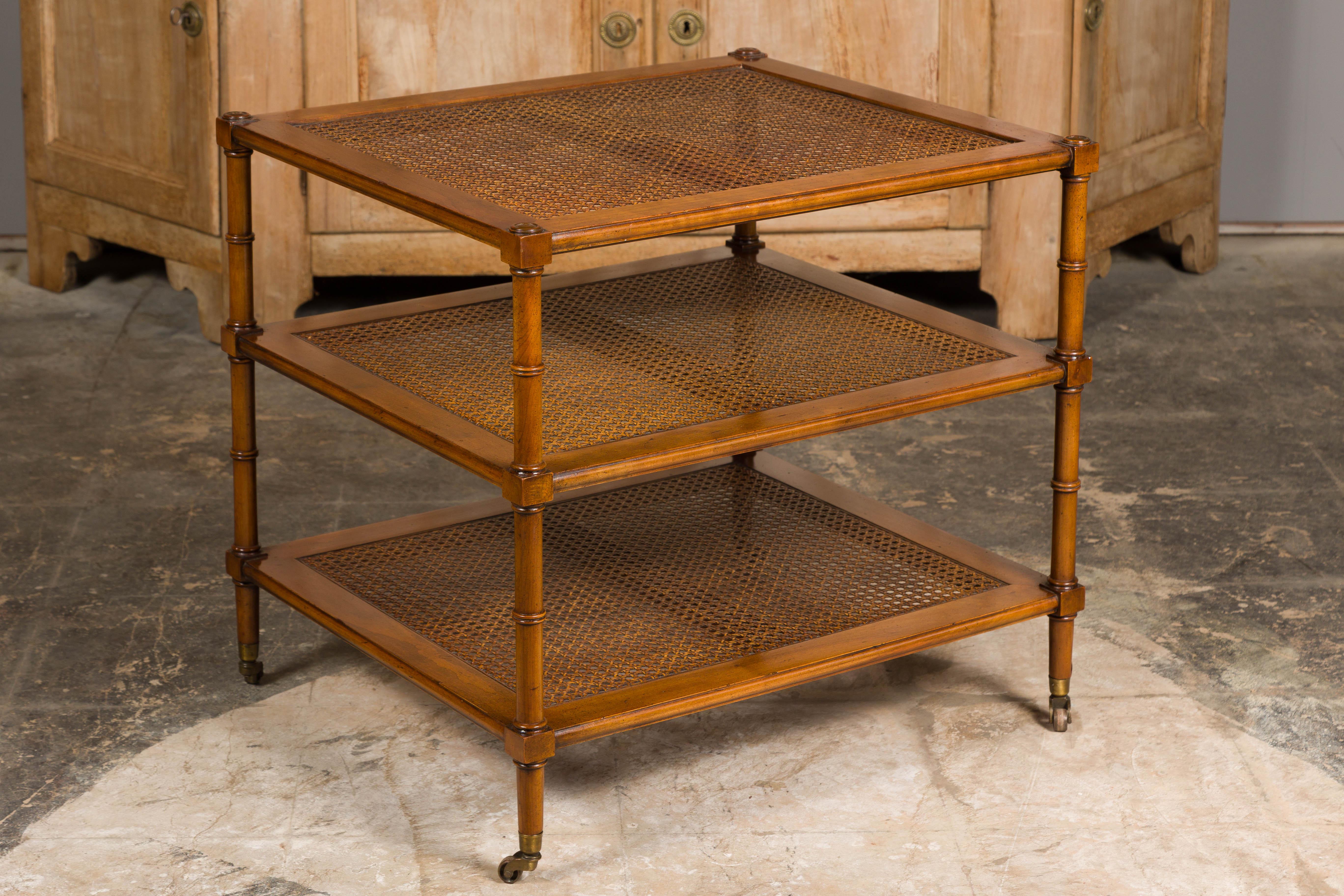 English Midcentury Faux Bamboo Tiered Table on Casters with Three Cane Shelves For Sale 6