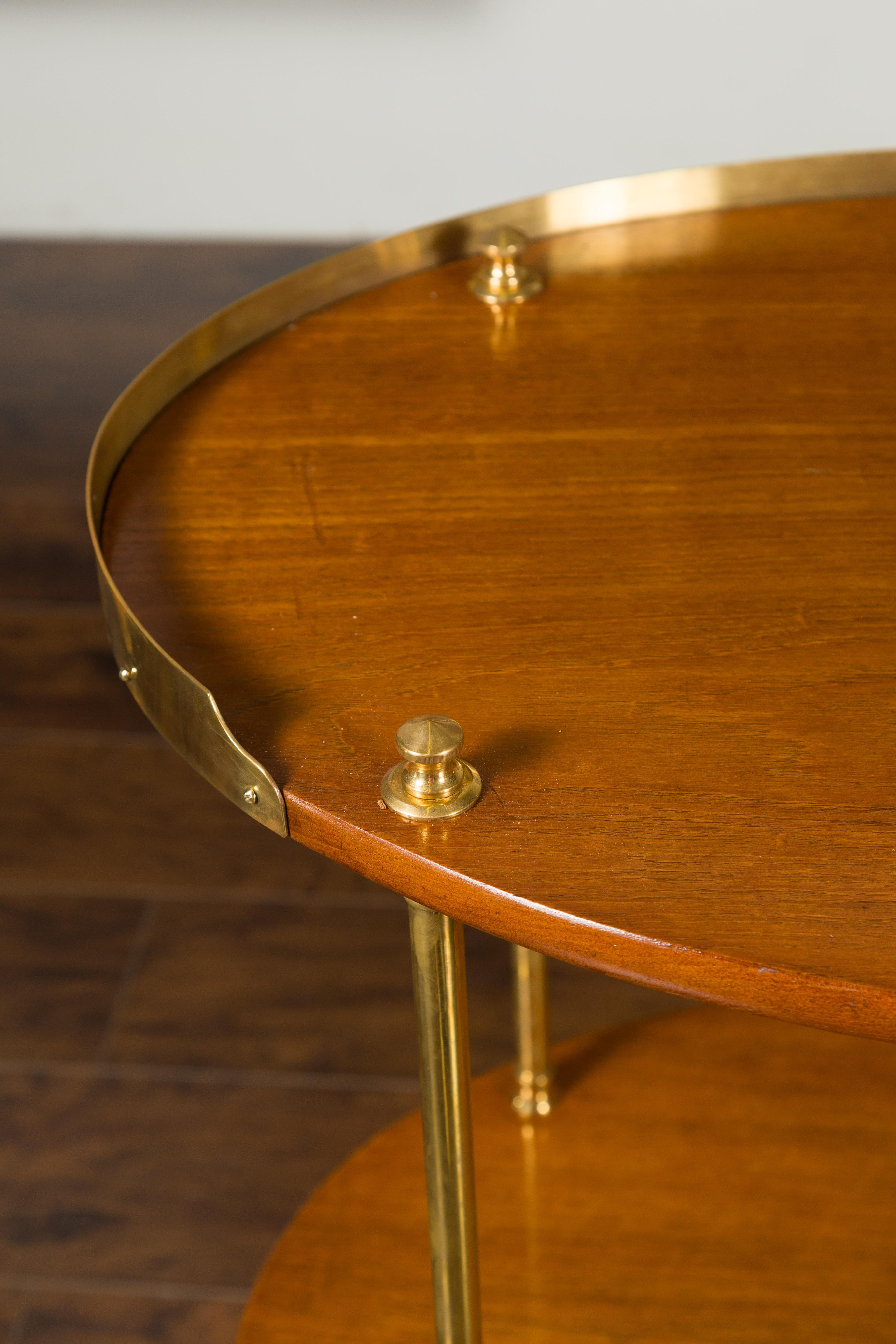 20th Century English Midcentury Mahogany Oval Two-Tiered Table with Brass Accents For Sale