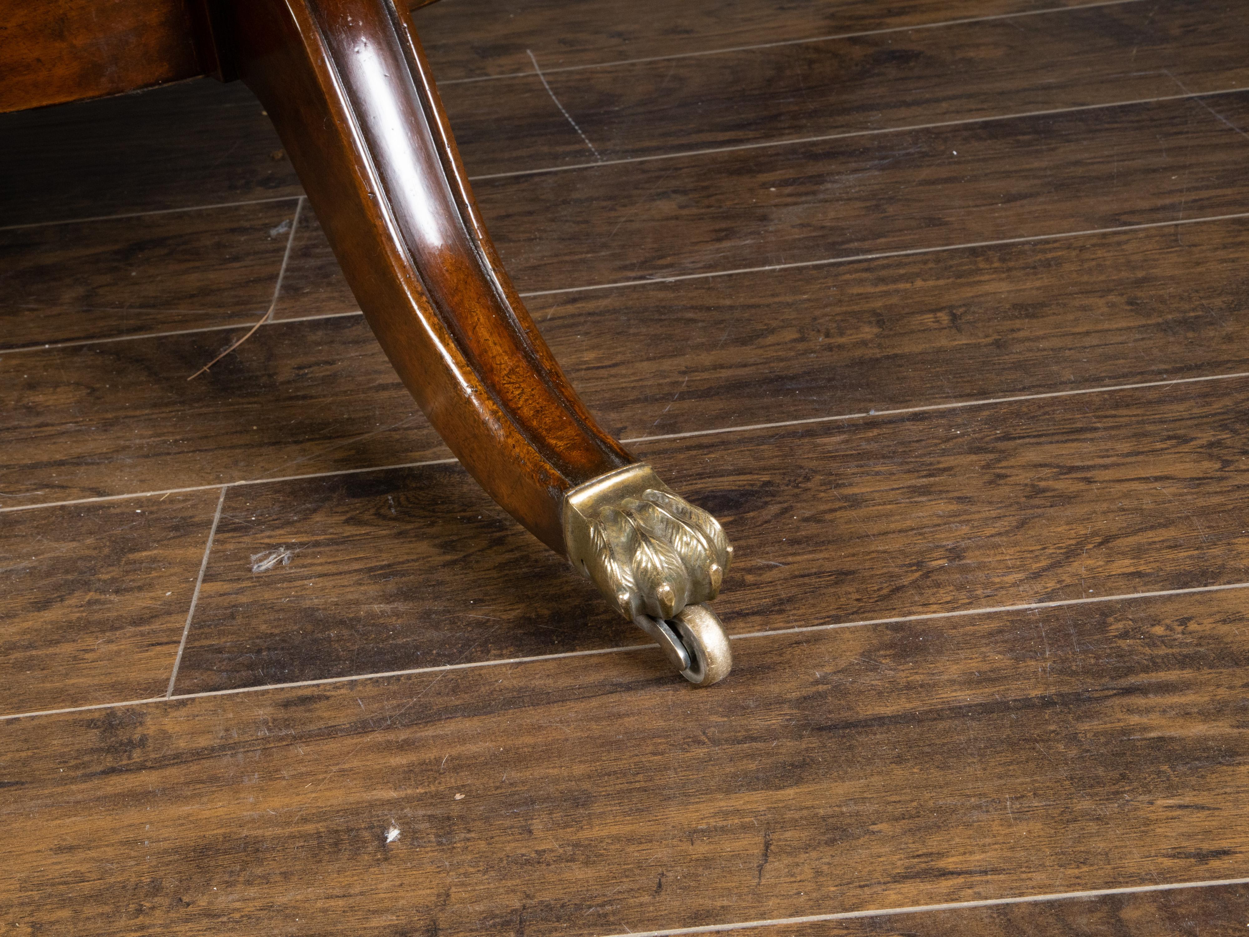 Turned English Midcentury Mahogany Round Dining Table with Quadripod Base and Paw Feet