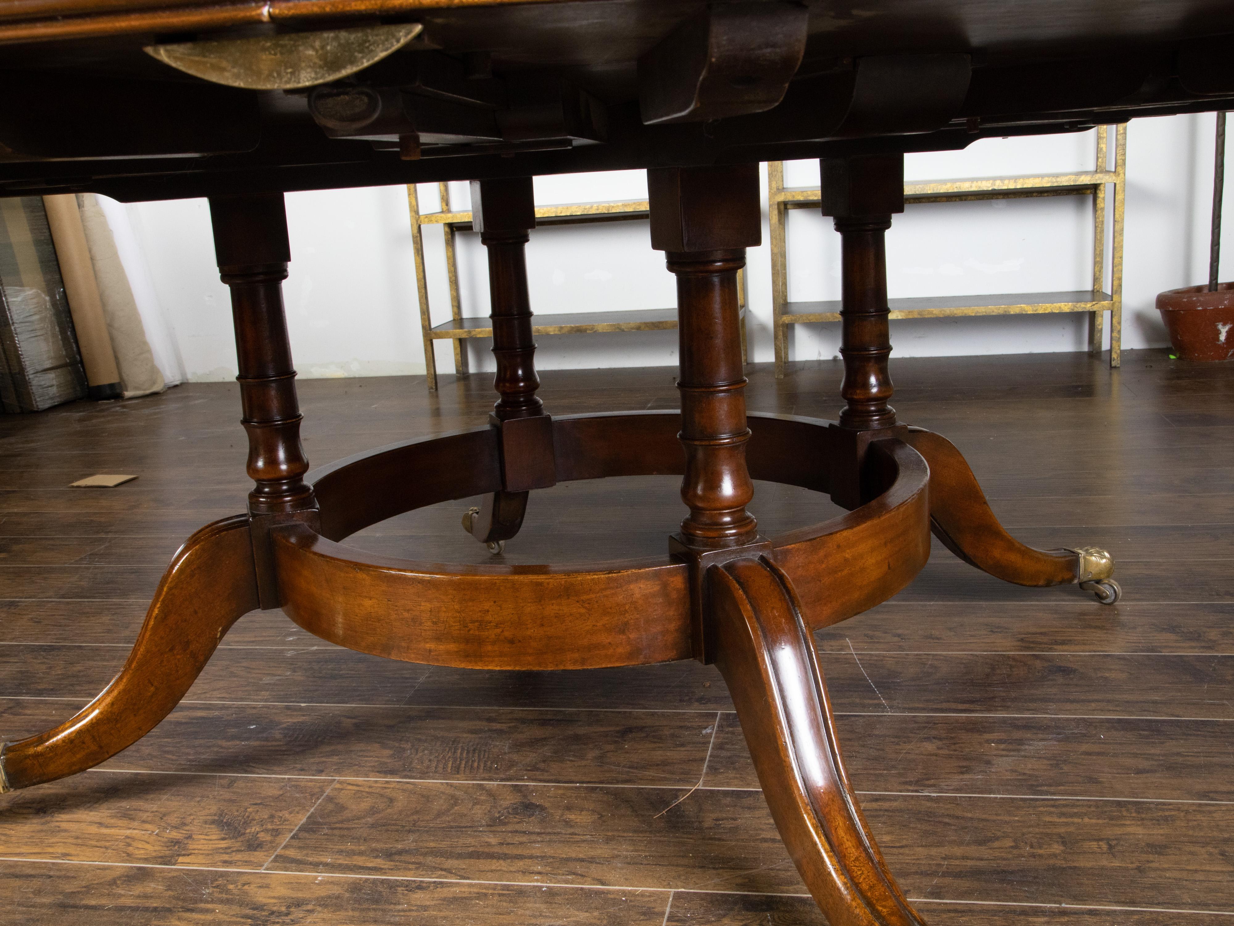 English Midcentury Mahogany Round Dining Table with Quadripod Base and Paw Feet In Good Condition In Atlanta, GA