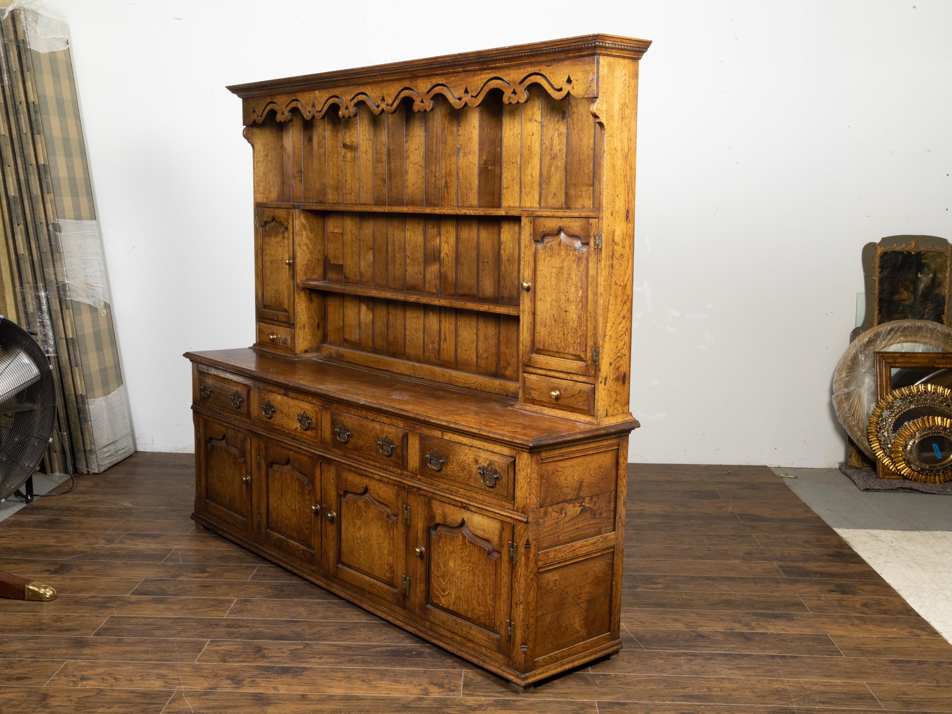 English Midcentury Oak Dresser with Carved Accents, Six Doors and Six Drawers For Sale 2