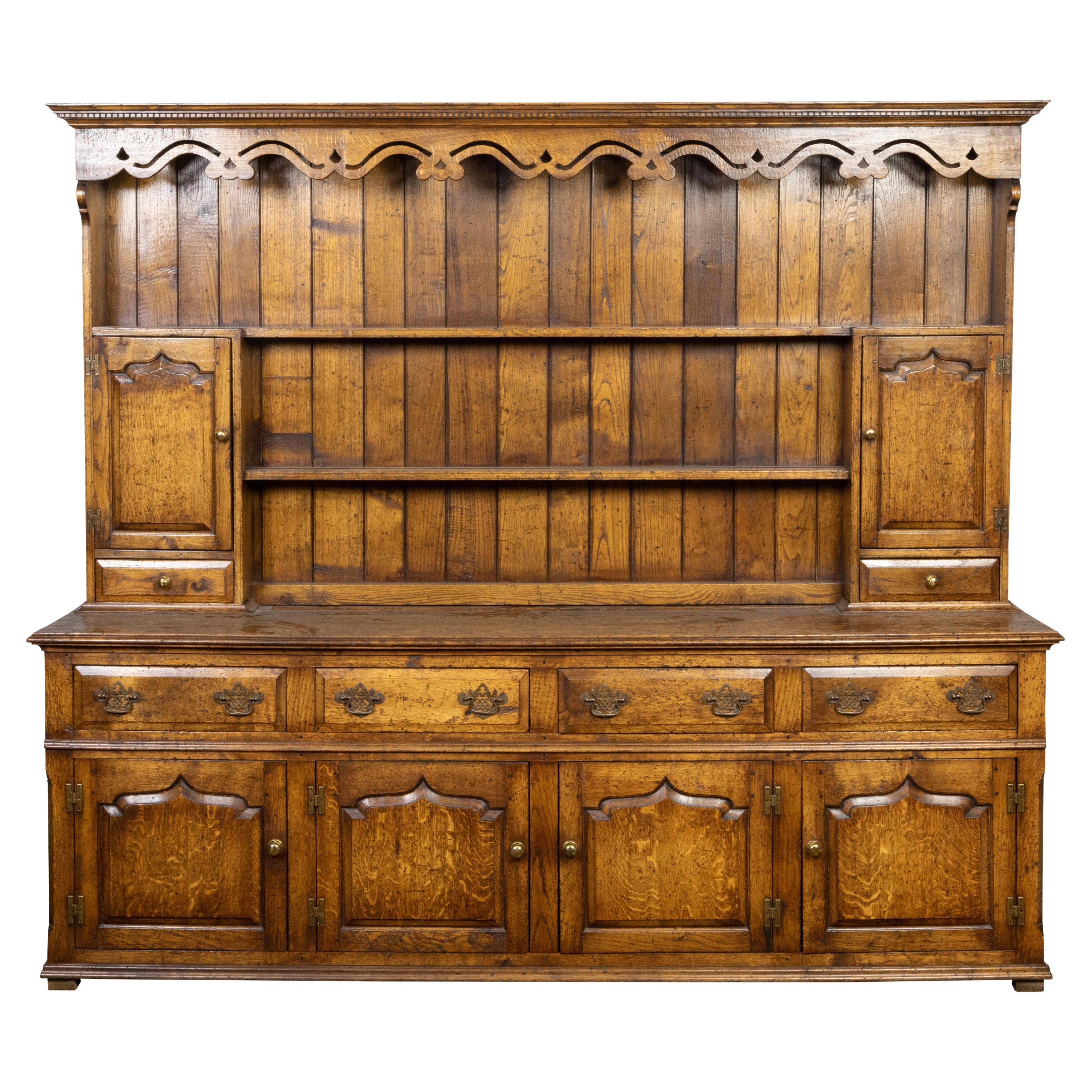 English Midcentury Oak Dresser with Carved Accents, Six Doors and Six Drawers