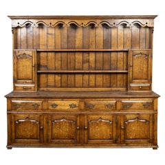 Retro English Midcentury Oak Dresser with Carved Accents, Six Doors and Six Drawers