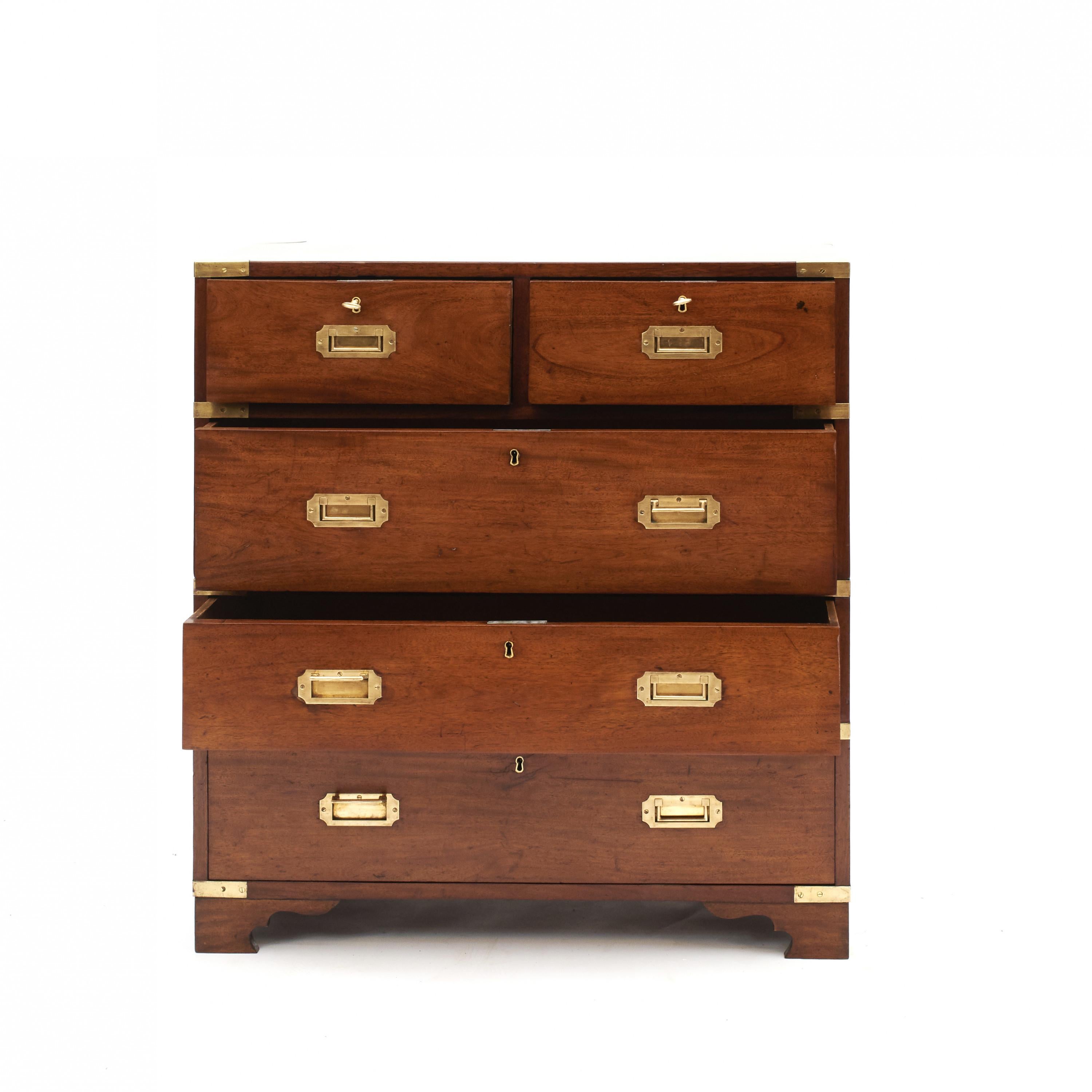 English military officer’s Campaign chest.
Made solid teak accented with brass fittings.
wo short drawers over three long drawers sitting on bracket feet,
England, circa 1880.

Campaign -era chests were the travel items of British military