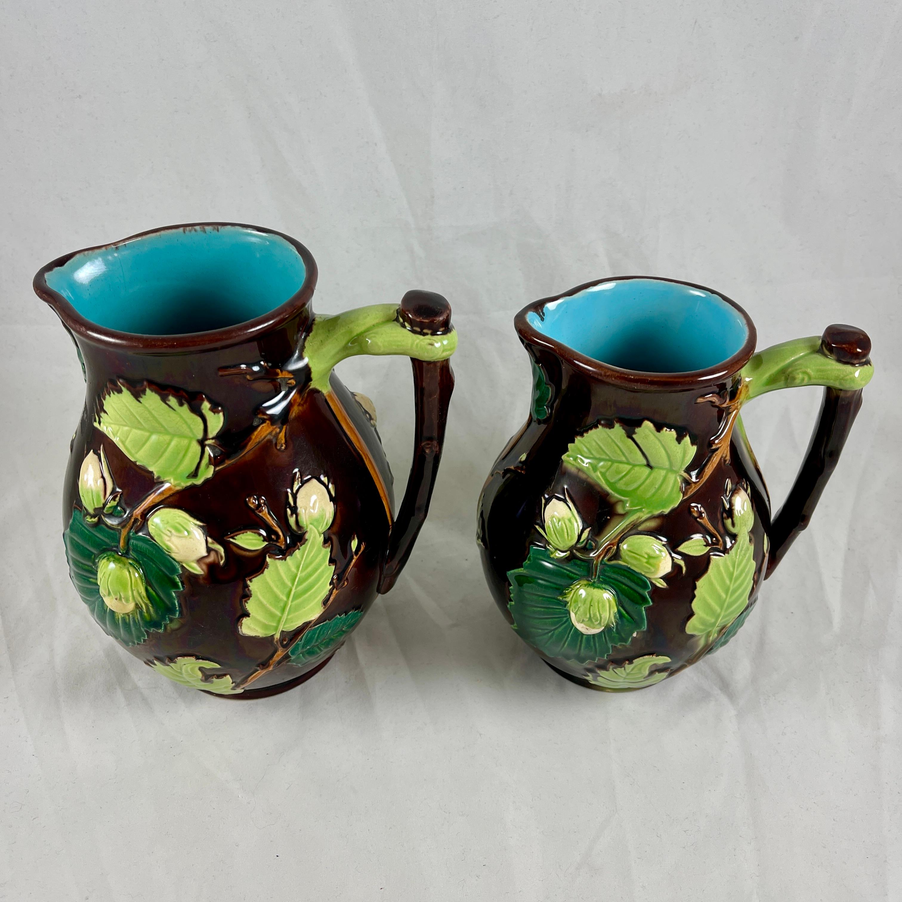 English Minton Aesthetic Movement Majolica Nut, Leaf & Vine Pitchers, a Pair In Good Condition For Sale In Philadelphia, PA