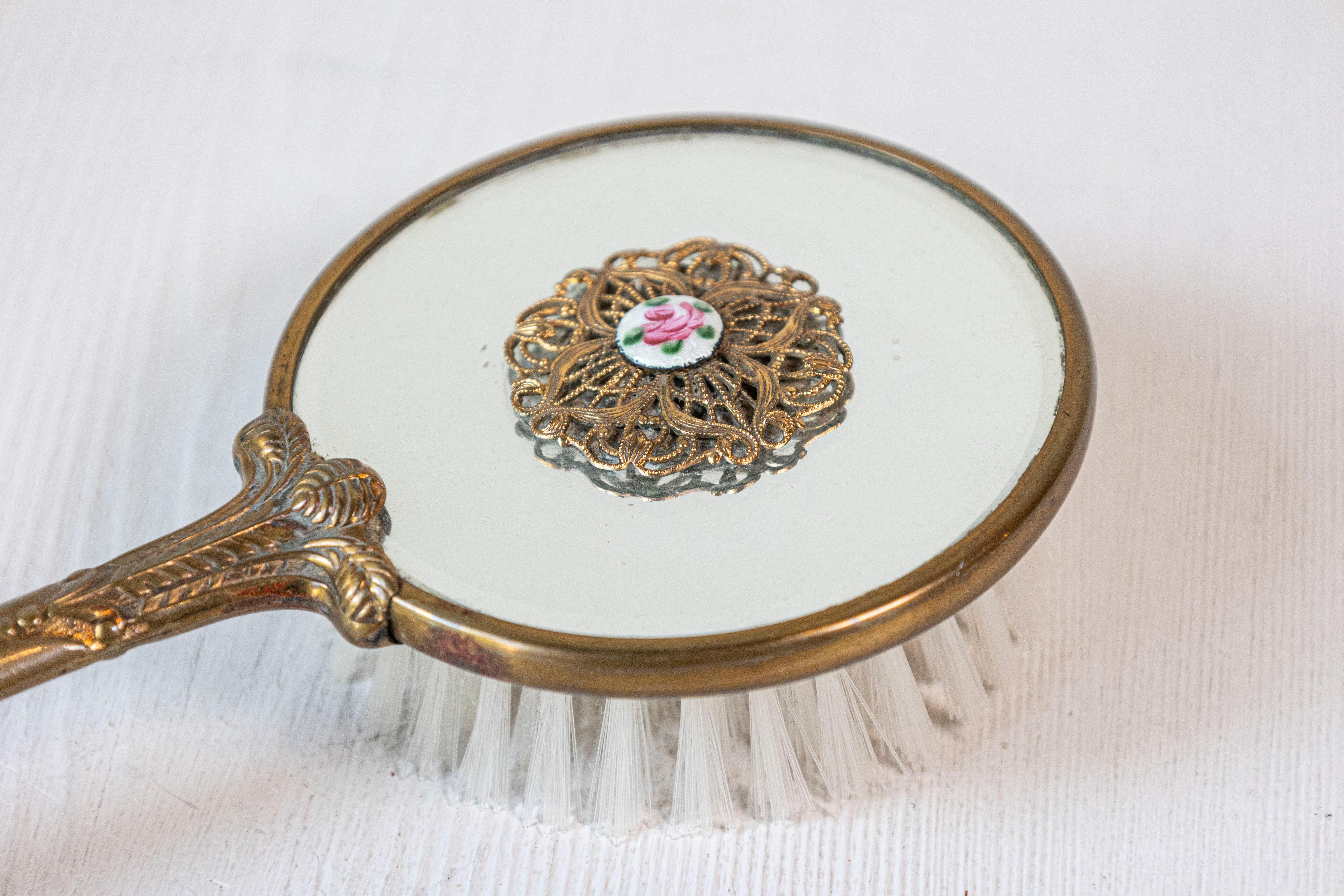 English Mirrored Hair Brush with Brass Finish, Filigree Décor and Medallion In Good Condition For Sale In Atlanta, GA
