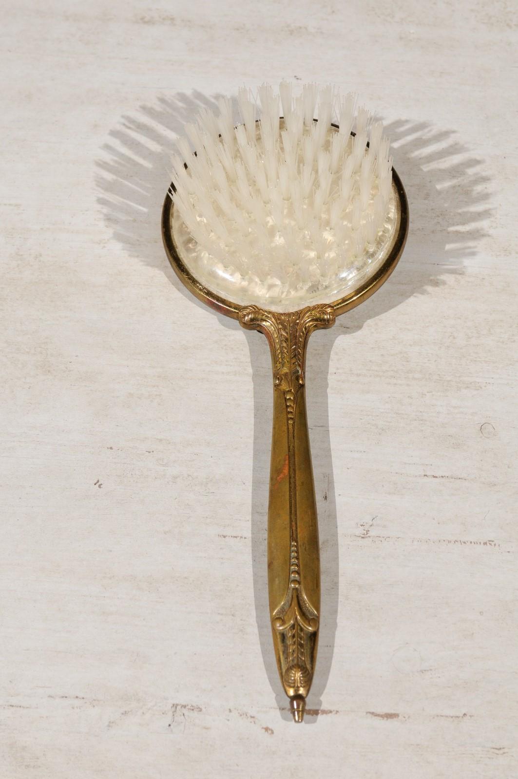 English Mirrored Hair Brush with Brass Finish, Filigree Décor and Medallion In Good Condition For Sale In Atlanta, GA