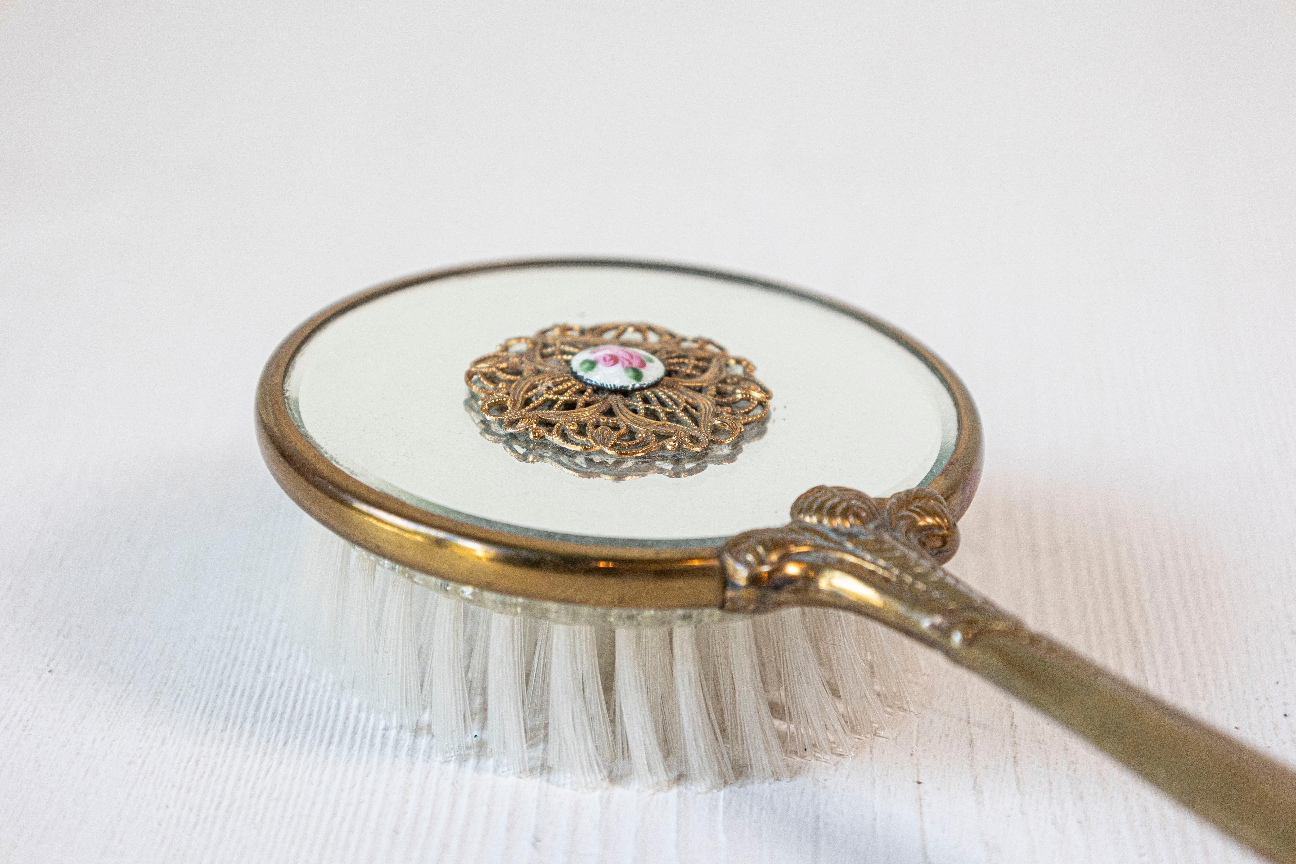 English Mirrored Hair Brush with Brass Finish, Filigree Décor and Medallion For Sale 2