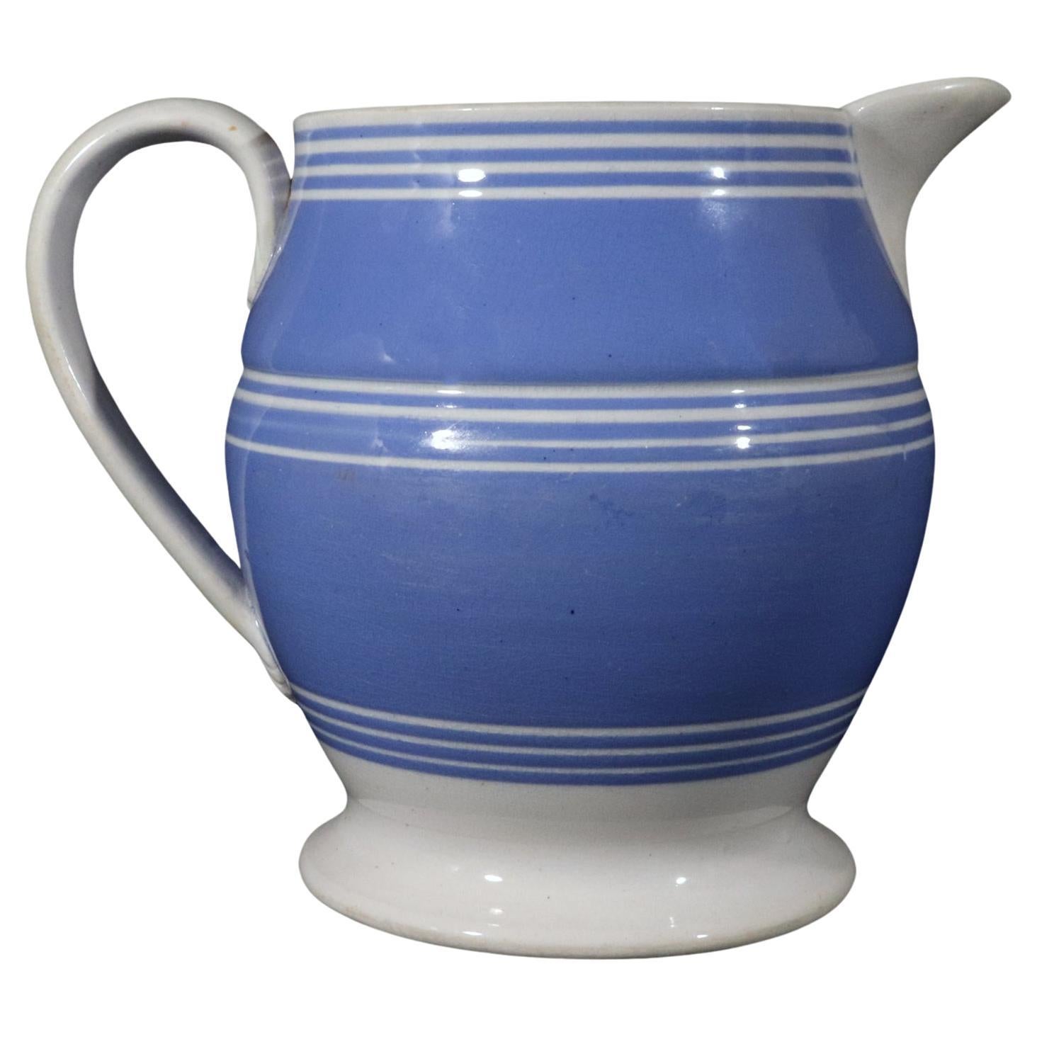 English Mocha Pottery Blue Slip Jug