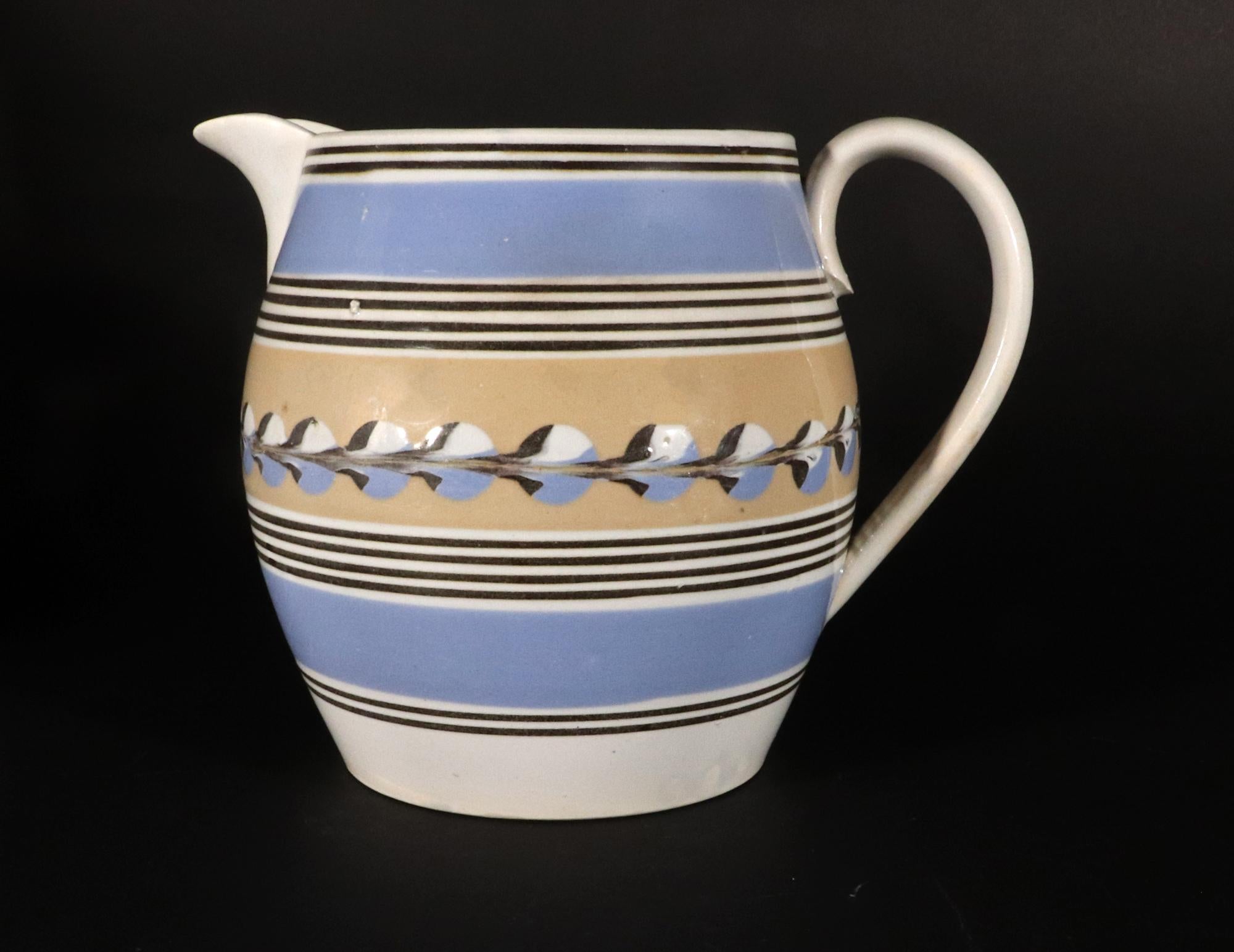 English Mocha Pottery Blue & Yellow Slip Jug with Cat's Eye Decoration In Good Condition For Sale In Downingtown, PA