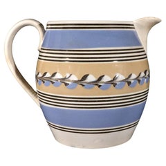 Used English Mocha Pottery Blue & Yellow Slip Jug with Cat's Eye Decoration