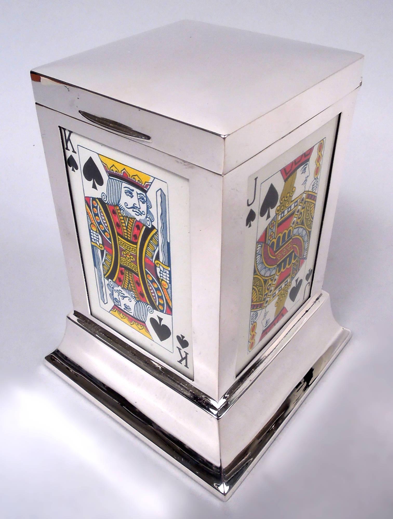 George V sterling silver playing cards box. Made by S. Blanckensee & Son in Birmingham in 1926. Pillar with hinged and tabbed cover and raised and spread base. Each side glazed and faced with royalty (one king, two queens, one jack). Box interior