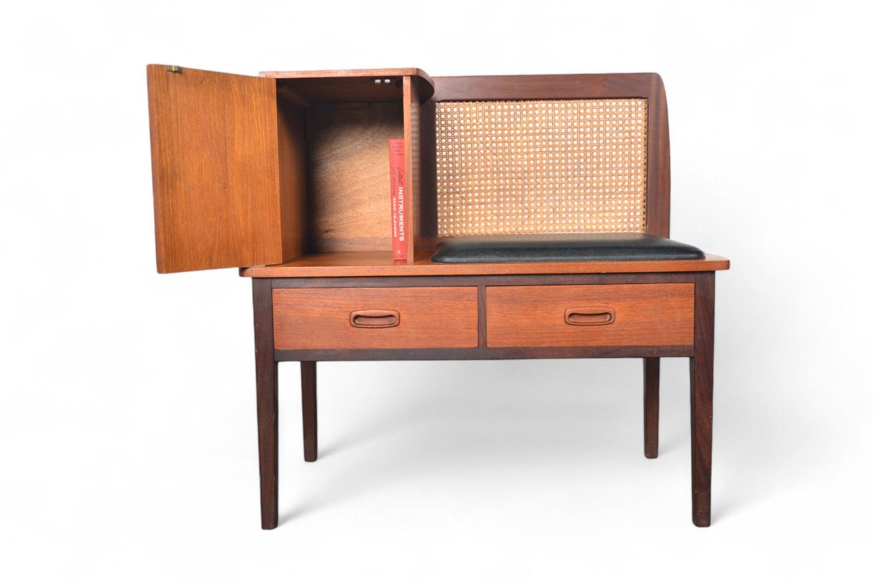 Origin: England
Designer: Unknown
Manufacturer: Jentique
Era: 1960s
Materials: Teak, Afromosia, Cane
Measurements: 32.5