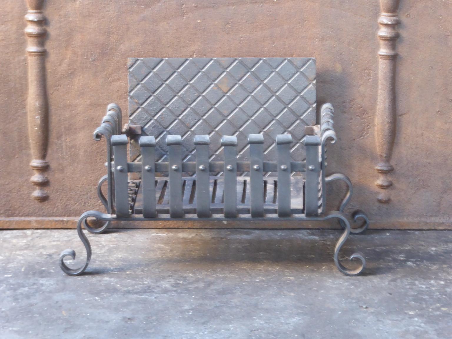 English modernist fireplace basket or fire basket. The fireplace grate is made of wrought iron and cast iron.

















 