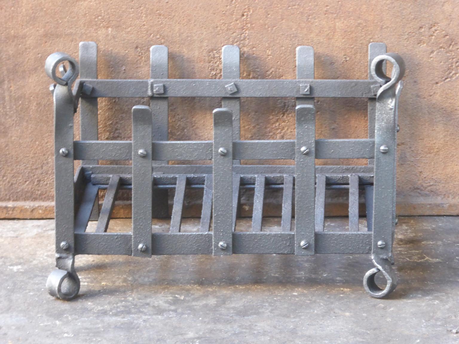 English Modernist fireplace basket or fire basket. The fireplace grate is made of wrought iron. 

















  