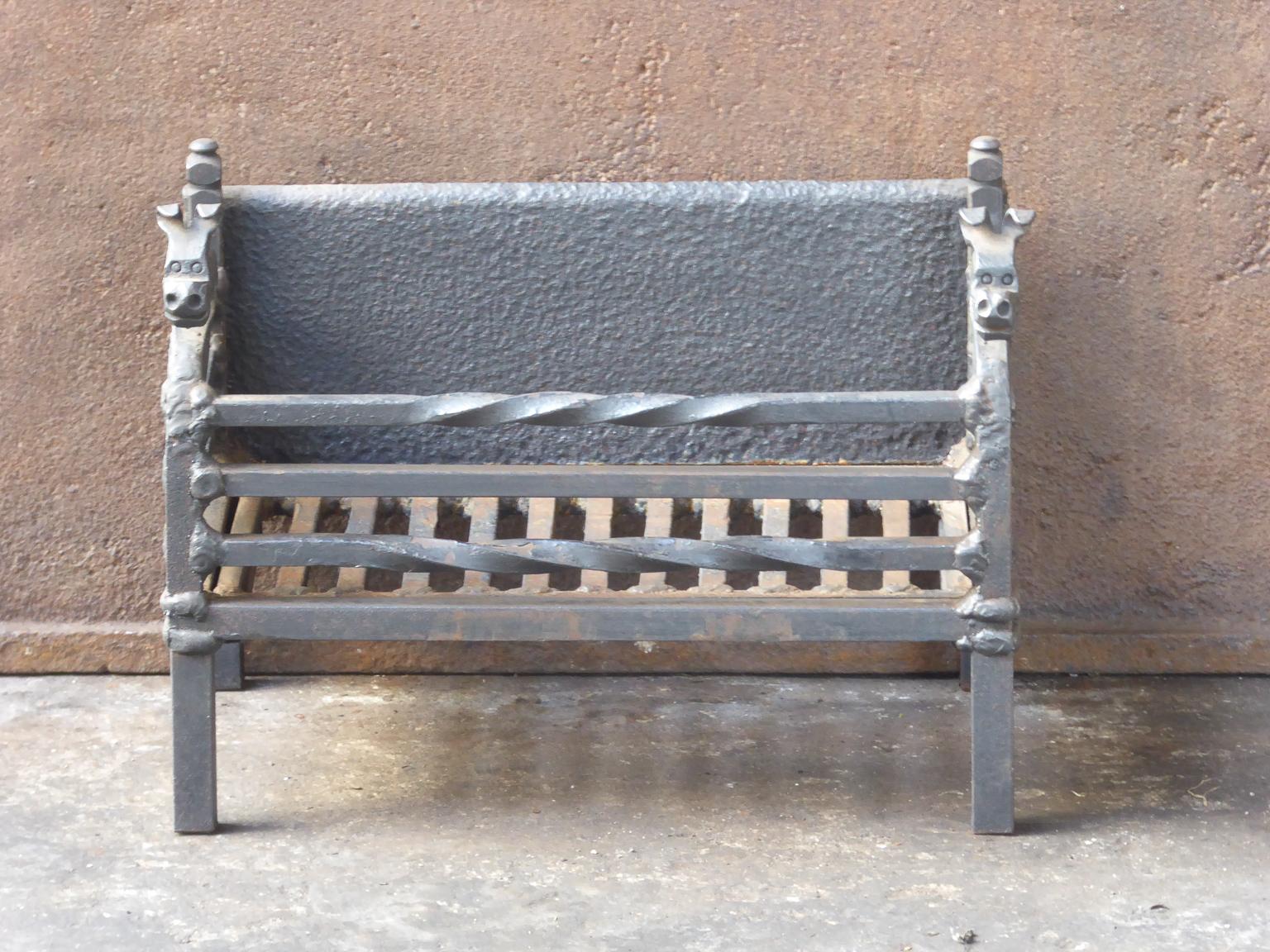 English modernist fireplace basket or fire basket. The fireplace grate is made of wrought iron.

















 