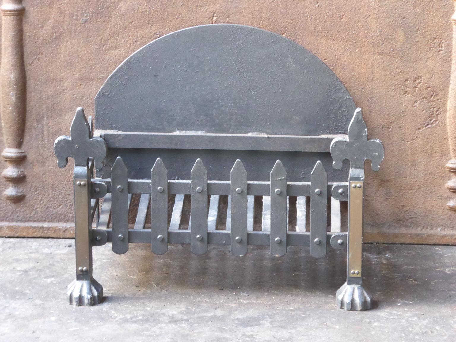 English Modernist fireplace basket or fire basket. The fireplace grate is made of wrought iron and brass.

















  