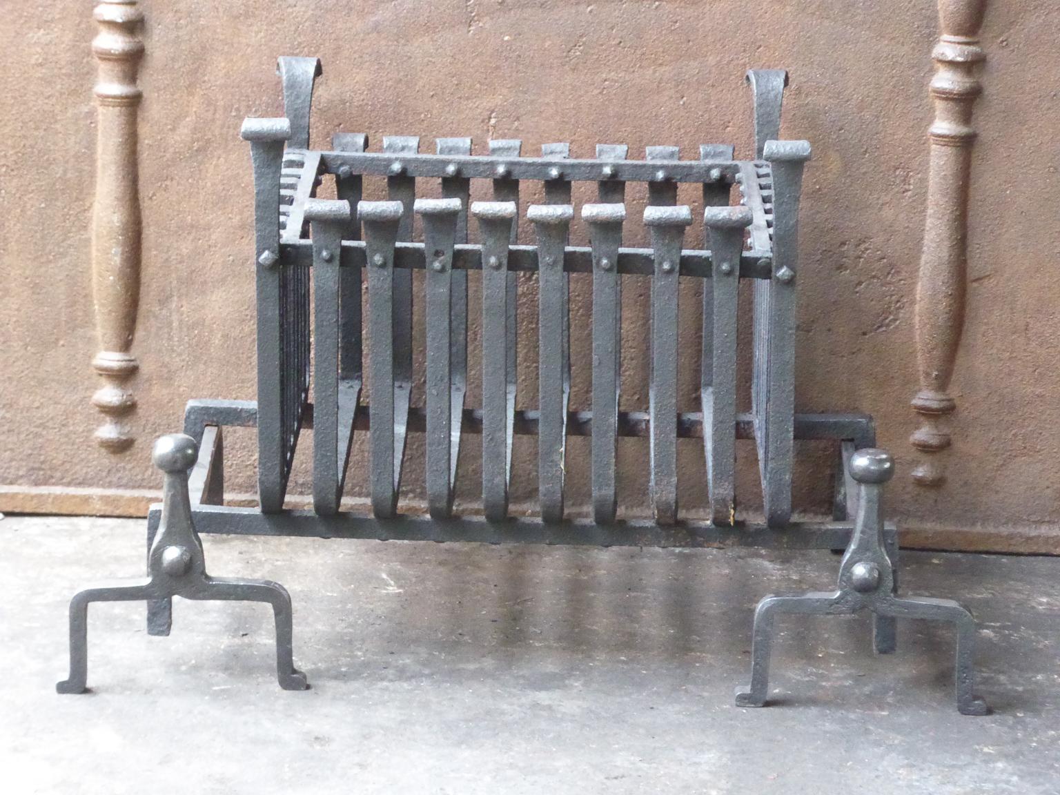 English modernist fireplace basket or fire basket. The fireplace grate is made of wrought iron. The total width of the front of the grate is 27 inch (68 cm).

















 