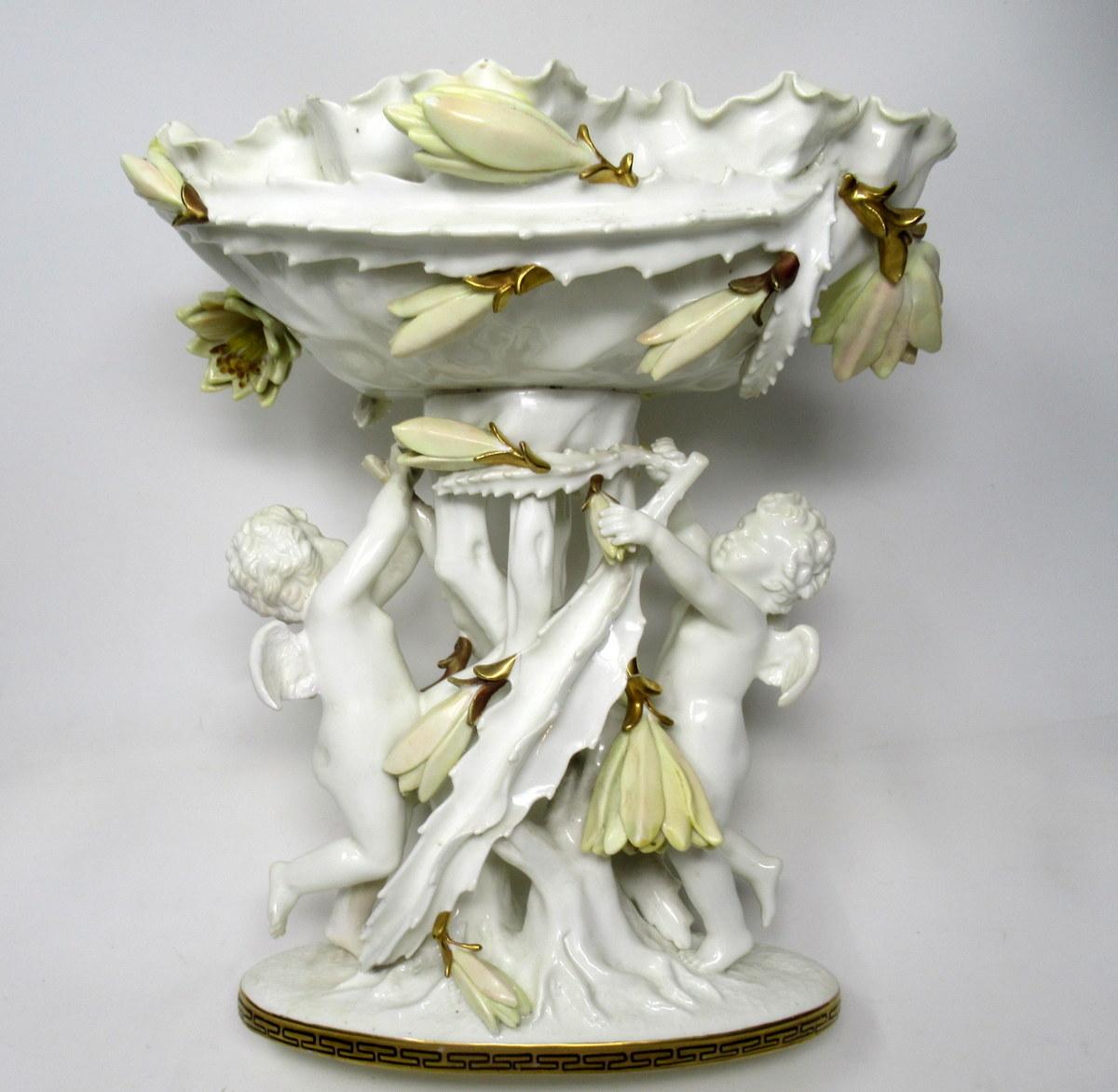 A very impressive example of an English Moore Brothers porcelain centerpiece of outstanding quality and generous proportions. 

Last quarter of the 19th century.

This rare and unusual tall form Centerpiece depicting flowering Cacti, with a pair