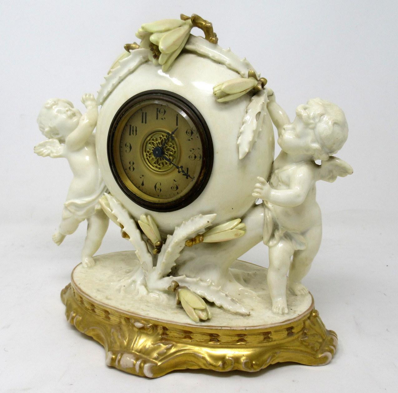 A very unusual and possibly quite rare English Moore Glazed Porcelain mantel (fireplace) timepiece clock of impressive proportions. The circular 7cm. dial of ormolu with Arabic numerals, the circular porcelain case moulded with flowering cacti