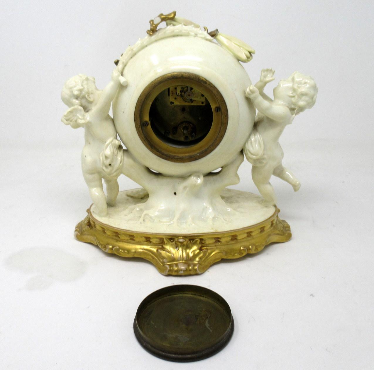 Late 19th Century English Moore Brothers Porcelain Cream Gilt Cherub Cacti Mantle Clock Timepiece
