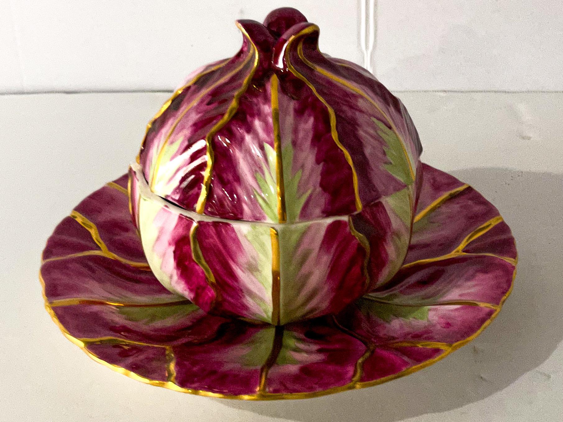 This is a English porcelain Mottahedeh cabbage form tureen and underplate. It is marked and in excellent condition.