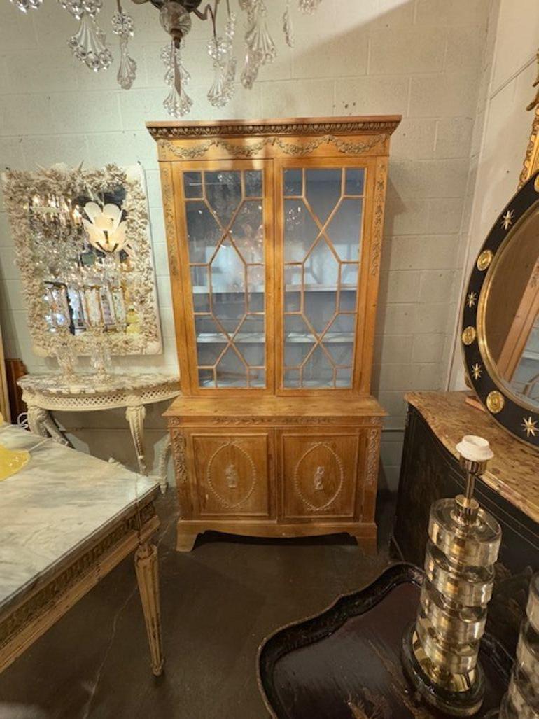 19th Century English Neo-classical carved pine display cabinet. Circa 1860. A fine addition to any home! 47w x 22d x 90h
