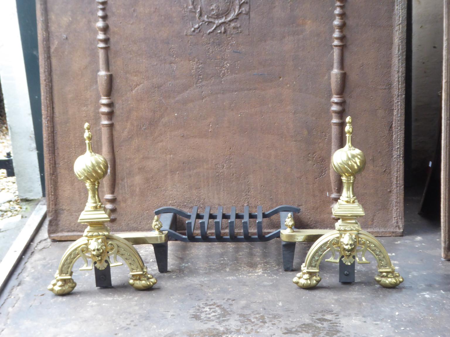 English Neo Gothic fireplace basket or fire basket. The fireplace grate is made of wrought iron, cast iron and polished brass. The total width of the front of the grate is 41 inch (104 cm).

















 