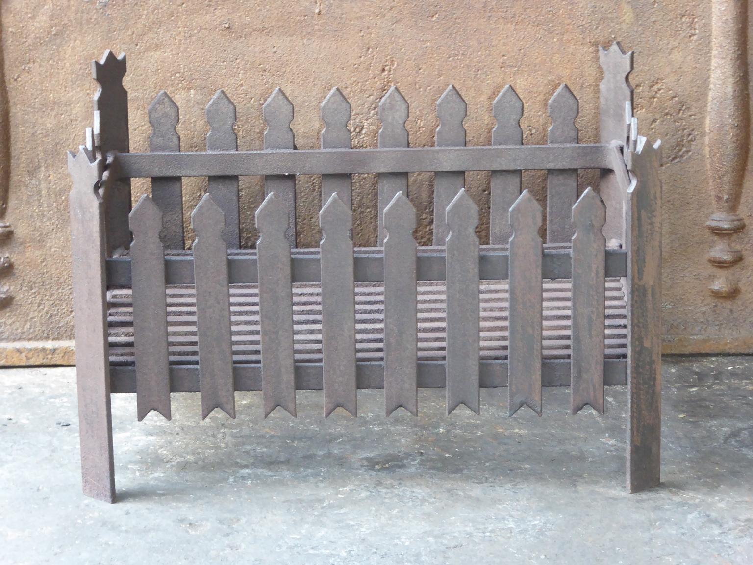 English neo Gothic fireplace style basket or fire basket. The fireplace grate is made of wrought iron. It has a natural brown patina. Upon request it can be made black.

















 