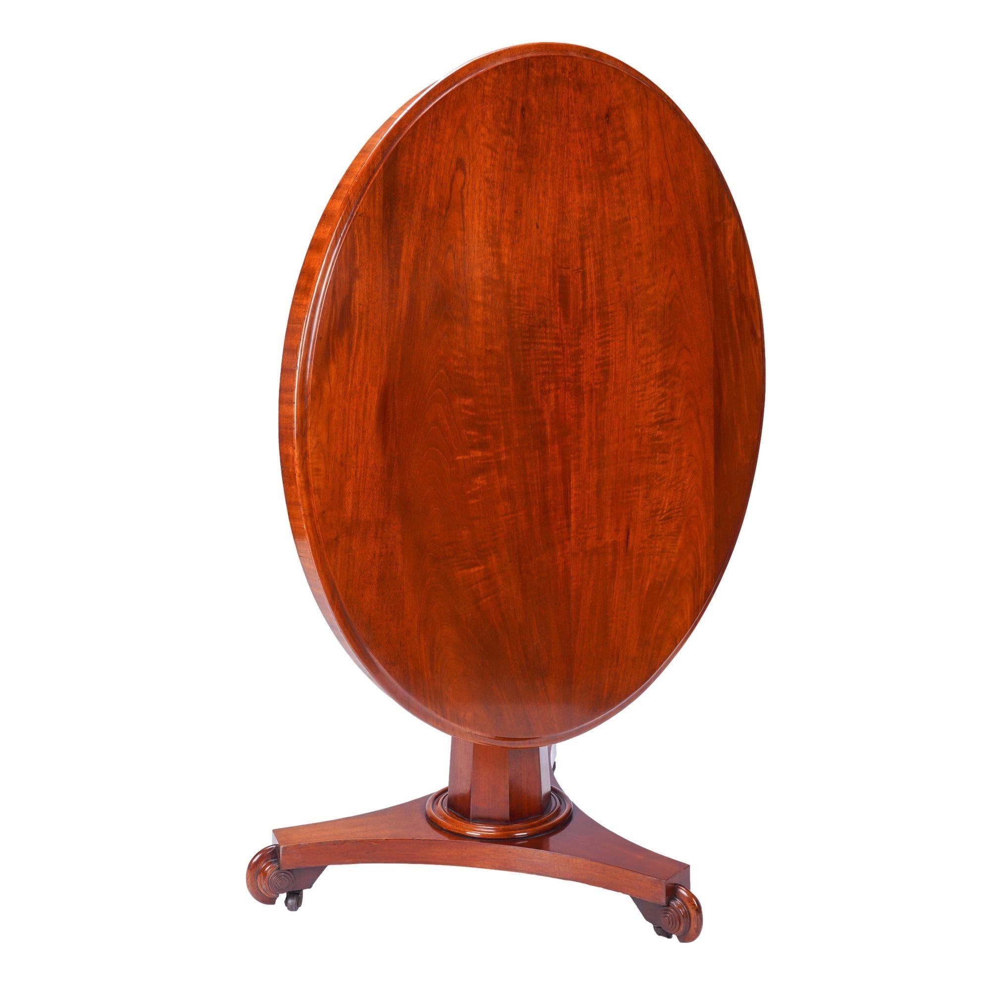 British English Neoclassic mahogany circular tilt top pedestal table, c. 1830 For Sale