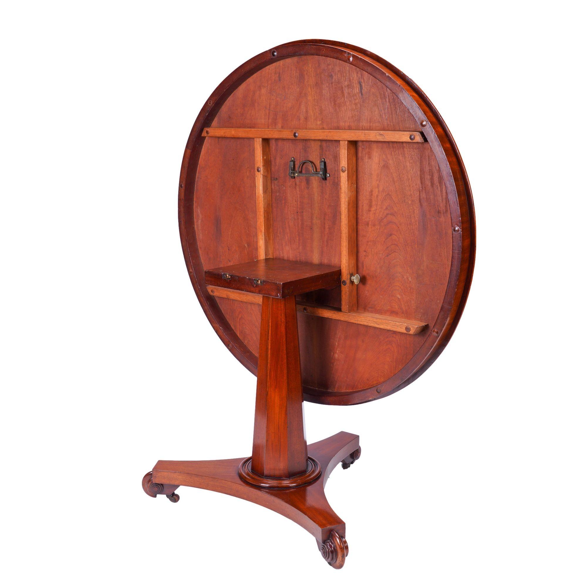 19th Century English Neoclassic mahogany circular tilt top pedestal table, c. 1830 For Sale