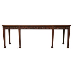 Mesa consola inglesa de caoba del siglo XIX de estilo neoclásico con guirnaldas talladas