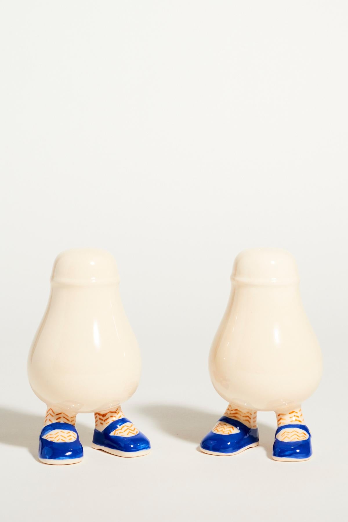 English novelty salt and pepper shakers with blue Mary Jane shoes.