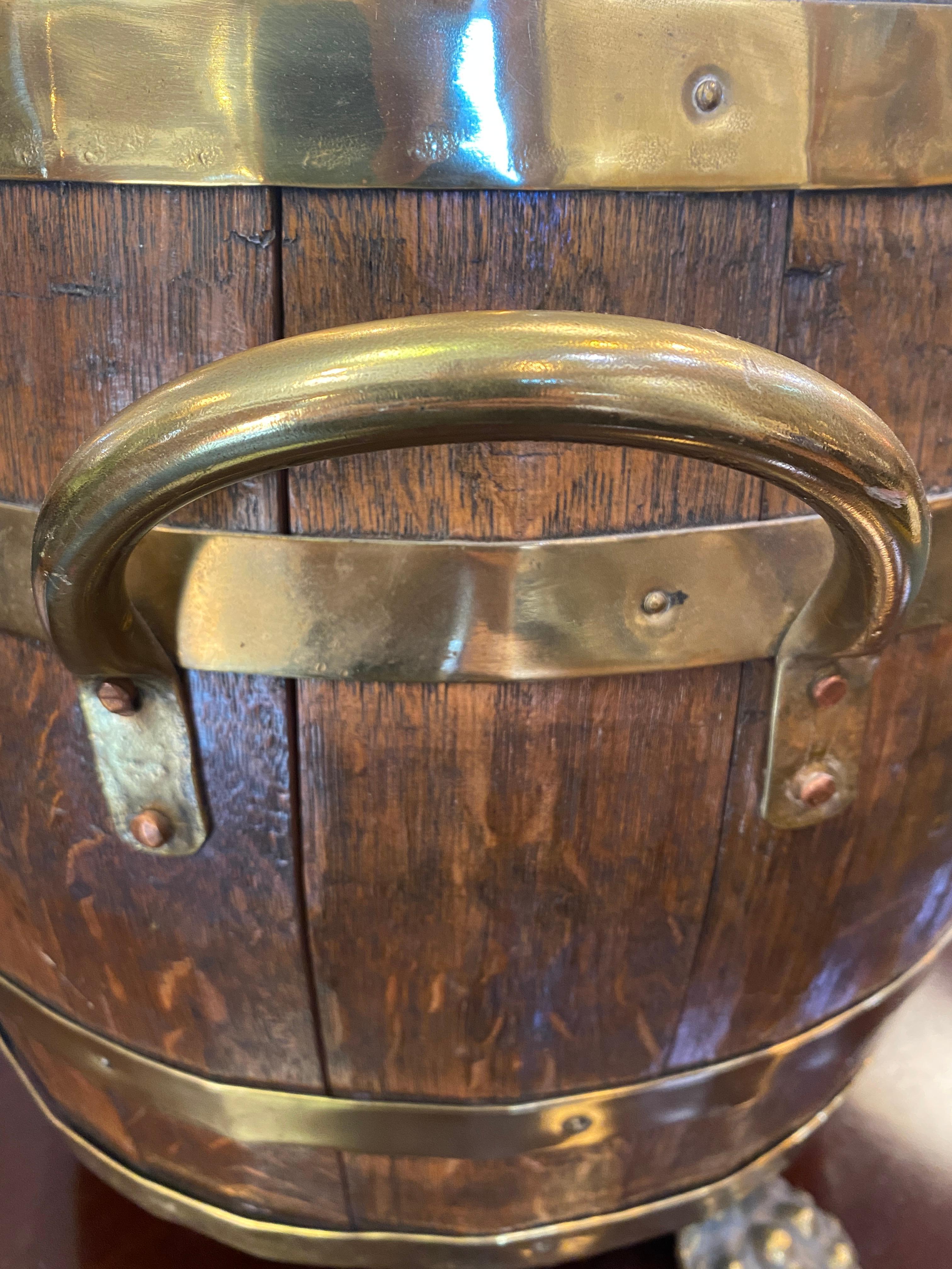 English Oak and Brass Barrel Shaped Cellarette with Paw Feet 1