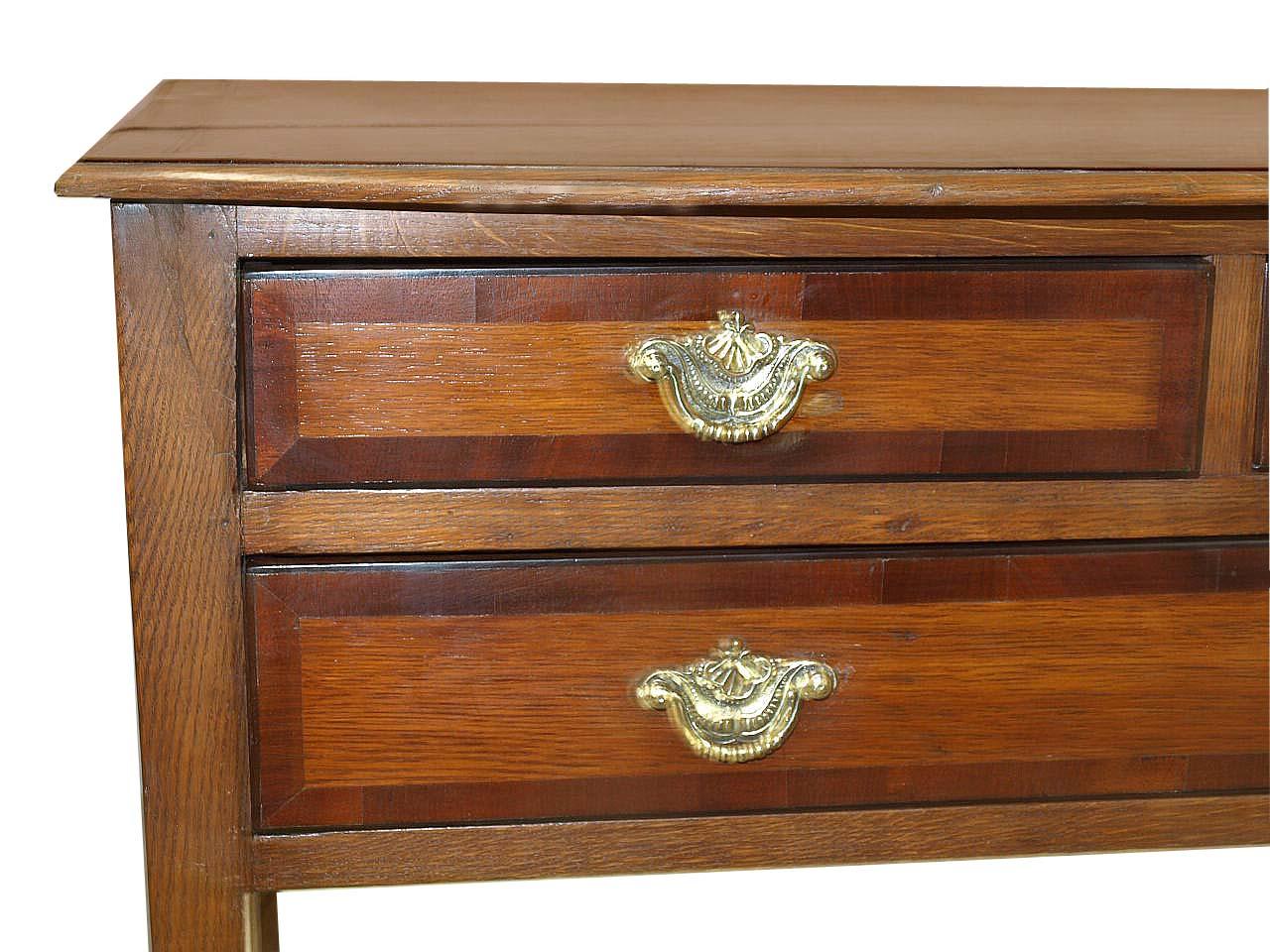 Early 19th Century English Oak and Mahogany Bow Front Lowboy For Sale