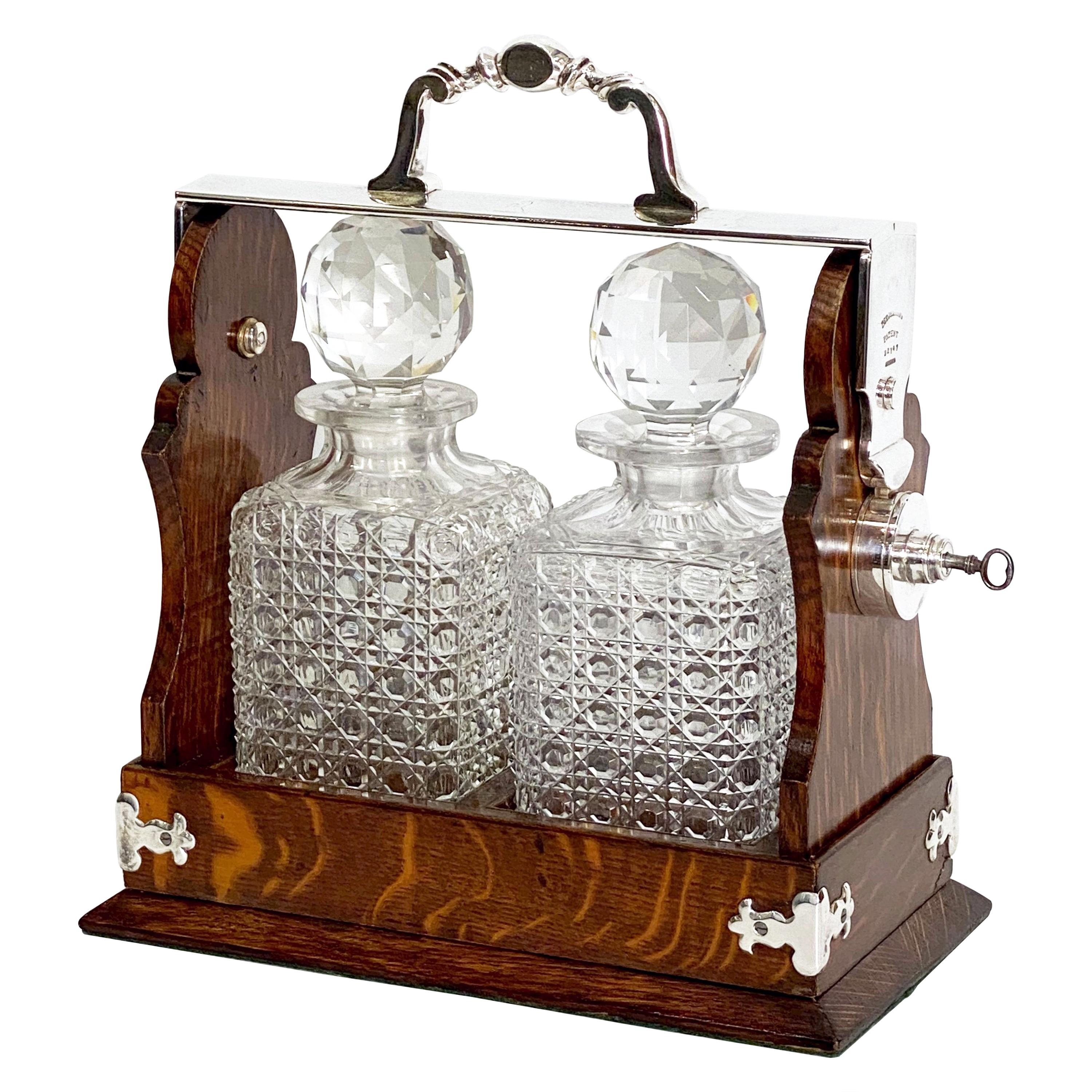 English Oak and Silver Tantalus or Decanter Drinks Set by Betjemann's
